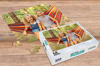 Thumbnail for 48-piece custom photo puzzle of 2 young girls swinging on a hammock along with the custom puzzle box | MakeYourPuzzles
