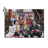 1000 piece 4th of July photo puzzle featuring a family celebrating with American flags and hot dogs.
