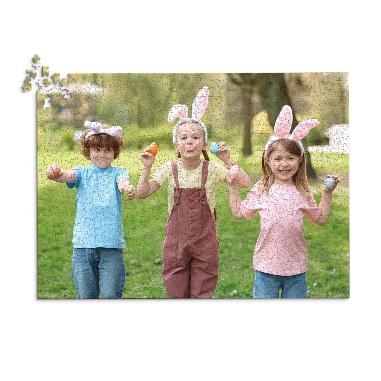 1000 piece Easter photo puzzle featuring three children wearing bunny ears and holding colorful Easter eggs.