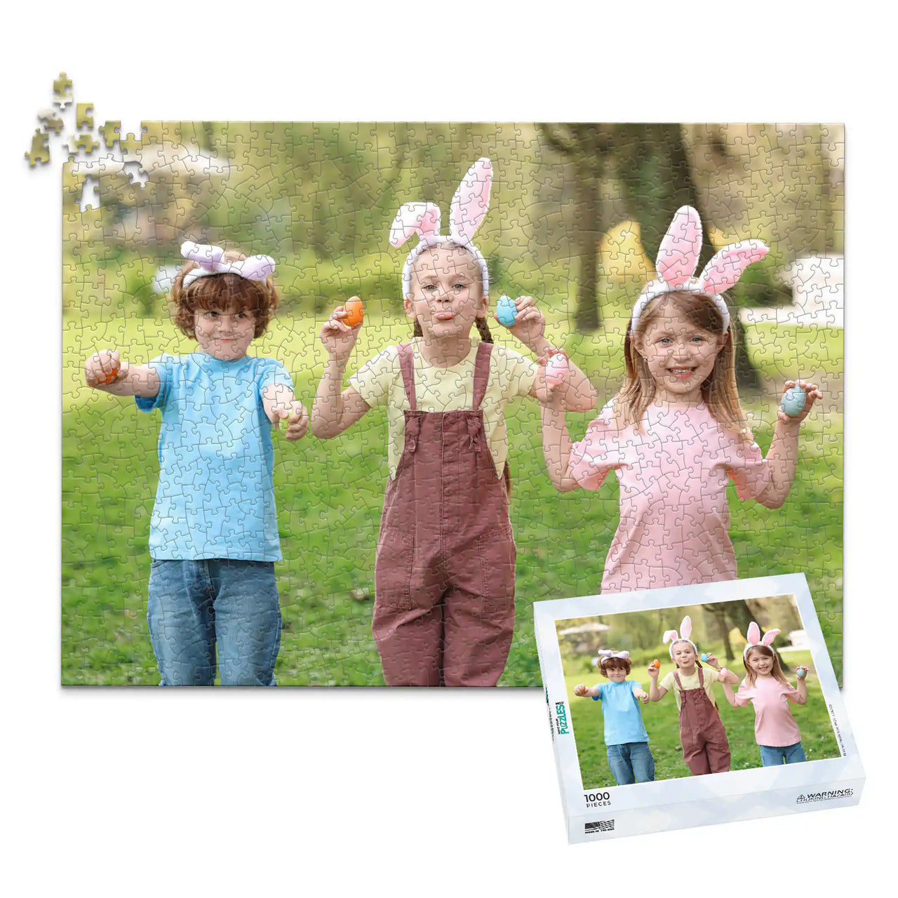 1000 piece Easter photo puzzle featuring three children wearing bunny ears and holding colorful Easter eggs, shown with its matching puzzle box