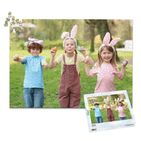 1000 piece Easter photo puzzle featuring three children wearing bunny ears and holding colorful Easter eggs, shown with its matching puzzle box
