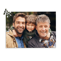 1000 piece personalized Dad puzzle showing a smiling father, son and grandfather.