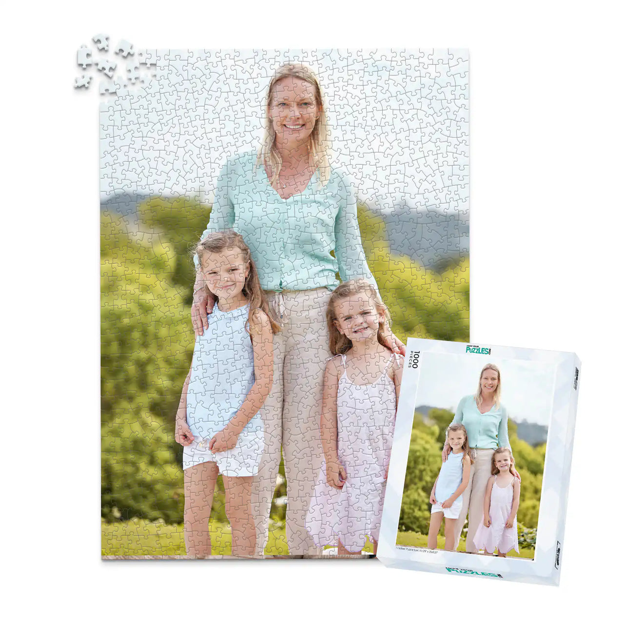 1000 piece personalized Mom puzzle featuring a mother with her two young daughters outdoors, shown with its matching puzzle box