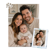 1000 piece personalized puzzle for new parents showing a smiling mother and father with their baby, displayed with the matching puzzle box.