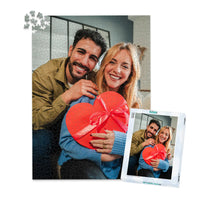 1000 piece personalized Valentine puzzle featuring a smiling couple with a heart-shaped gift, shown with its matching puzzle box