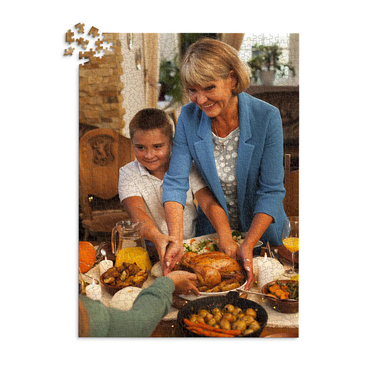 1000 piece Thanksgiving photo puzzle featuring a grandmother and grandson serving turkey at a family dinner.
