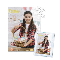 100 piece Easter photo puzzle featuring a smiling girl holding a basket of colorful Easter eggs, shown with its matching puzzle box