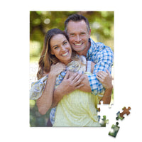 100 piece personalized couple puzzle featuring a smiling couple embracing outdoors.