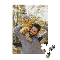 100 piece personalized Dad puzzle showing a smiling father carrying his baby on his shoulders.