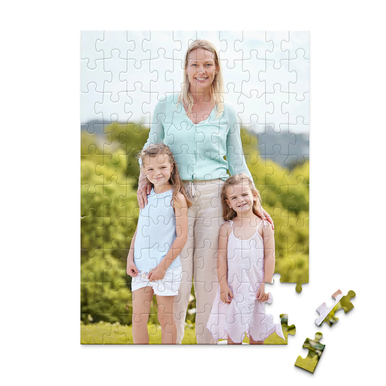 100 piece personalized Mom puzzle featuring a mother with her two young daughters outdoors.