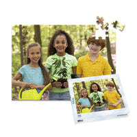 100 piece personalized puzzle for kids showing three smiling children gardening together, displayed with the matching puzzle box.