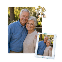 100 piece personalized puzzle for grandparents showing a smiling elderly couple together, displayed with the matching puzzle box.