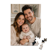 100 piece personalized puzzle for new parents showing a smiling mother and father with their baby.