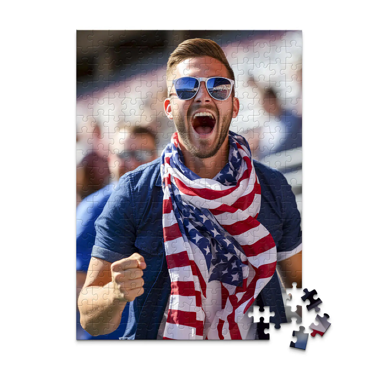 252 piece 4th of July photo puzzle featuring a cheering man wearing an American flag scarf.