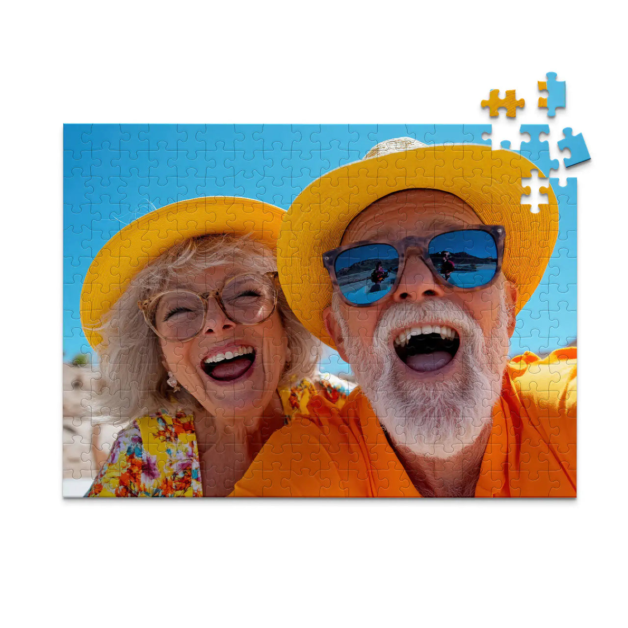252 piece personalized couple puzzle featuring a joyful older couple wearing sun hats at the beach.