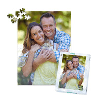 252 piece personalized couple puzzle featuring a smiling couple embracing outdoors, shown with its matching puzzle box