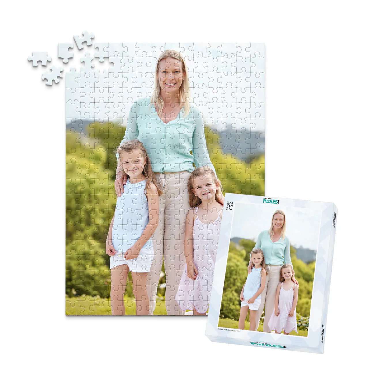 252 piece personalized Mom puzzle featuring a mother with her two young daughters outdoors, shown with its matching puzzle box