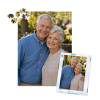 252 piece personalized puzzle for grandparents showing a smiling elderly couple together, displayed with the matching puzzle box.