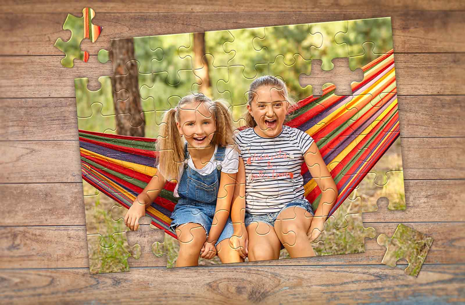 48-piece custom photo puzzle of 2 young girls swinging on a hammock | MakeYourPuzzles