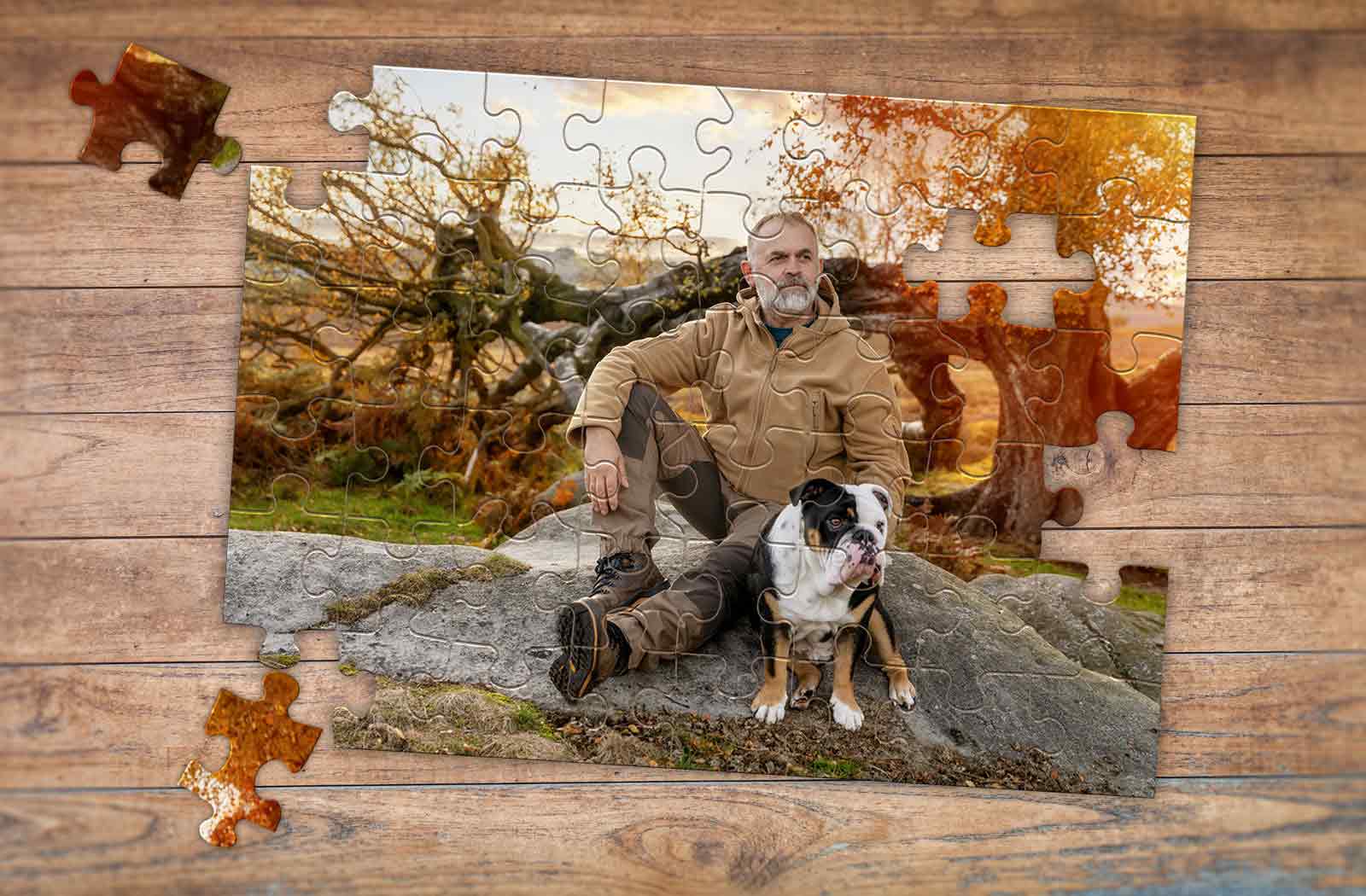 48 piece custom photo puzzle man and dog sitting on a rock formation in the fall | MakeYourPuzzles