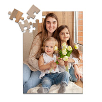 48 piece custom Mother’s Day photo puzzle featuring three daughters with flowers.