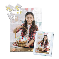 48 piece Easter photo puzzle featuring a smiling girl holding a basket of colorful Easter eggs, shown with its matching puzzle box