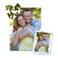 48 piece personalized couple puzzle featuring a smiling couple embracing outdoors, shown with its matching puzzle box