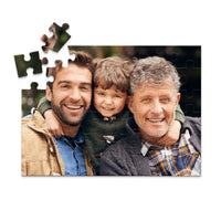 48 piece personalized Dad puzzle showing a smiling father, son and grandfather.