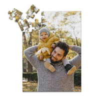 48 piece personalized Dad puzzle showing a smiling father carrying his baby on his shoulders.