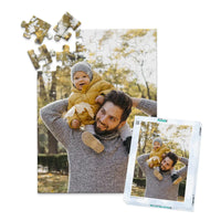 48 piece personalized Dad puzzle showing a smiling father carrying his baby on his shoulders, displayed with the matching puzzle box.