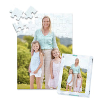 48 piece personalized Mom puzzle featuring a mother with her two young daughters outdoors, shown with its matching puzzle box