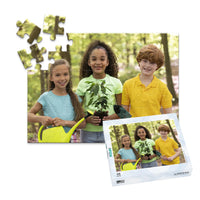 48 piece personalized puzzle for kids showing three smiling children gardening together, displayed with the matching puzzle box.