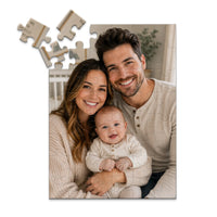 48 piece personalized puzzle for new parents showing a smiling mother and father with their baby.