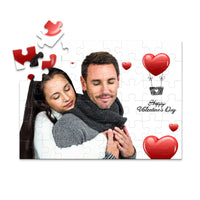 48 piece personalized Valentine puzzle featuring a couple embracing with heart decorations.