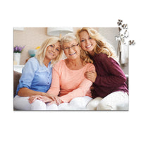 500 piece custom Mother’s Day photo puzzle featuring a mother with her two adult daughters.