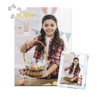 500 piece Easter photo puzzle featuring a smiling girl holding a basket of colorful Easter eggs, shown with its matching puzzle box