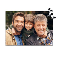 500 piece personalized Dad puzzle showing a smiling father, son and grandfather.
