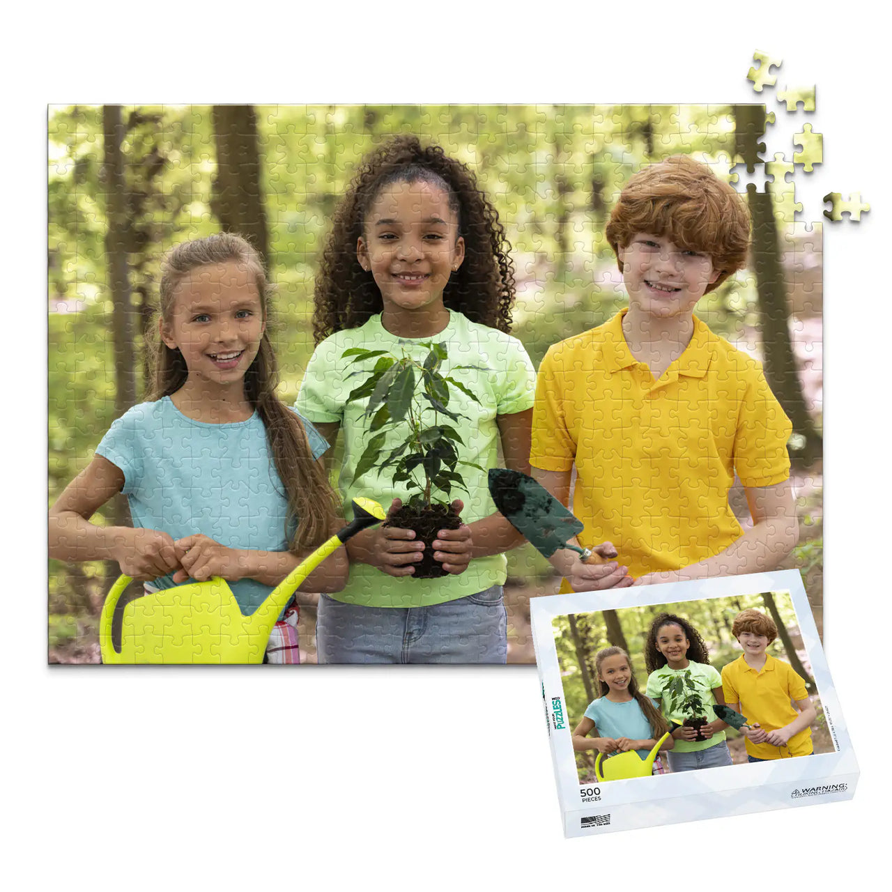 500 piece personalized puzzle for kids showing three smiling children gardening together, displayed with the matching puzzle box.