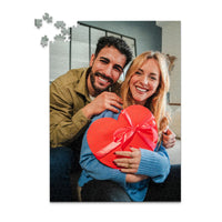 500 piece personalized Valentine puzzle featuring a smiling couple with a heart-shaped gift.