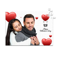 500 piece personalized Valentine puzzle featuring a couple embracing with heart decorations.