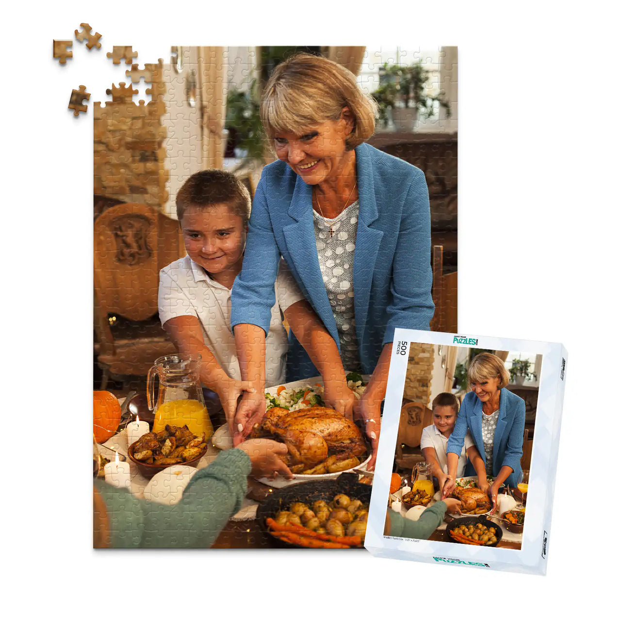 500 piece Thanksgiving photo puzzle featuring a grandmother and grandson serving turkey at a family dinner, shown with its matching puzzle box
