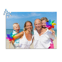 Custom Travel Photo Puzzle 1000 piece showing a family with two young kids on a beach with blue sky