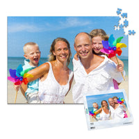 Custom Travel Photo Puzzle 500 piece with matching puzzle box showing a family with two young kids on a beach with blue sky
