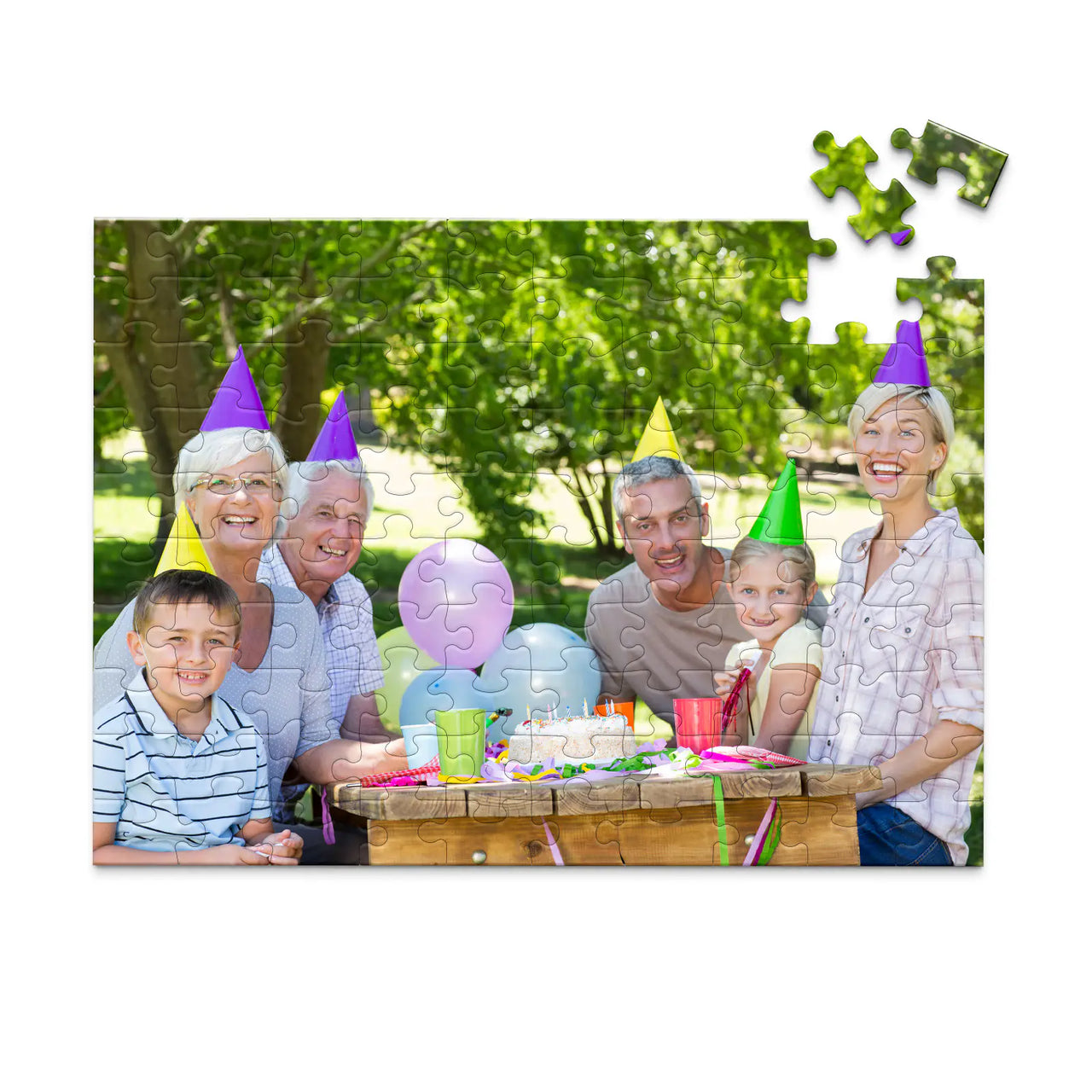 Personalized Birthday Puzzle Landscape orientation 100 Pieces showing a family portrait of six people celebrating a birthday outdoors