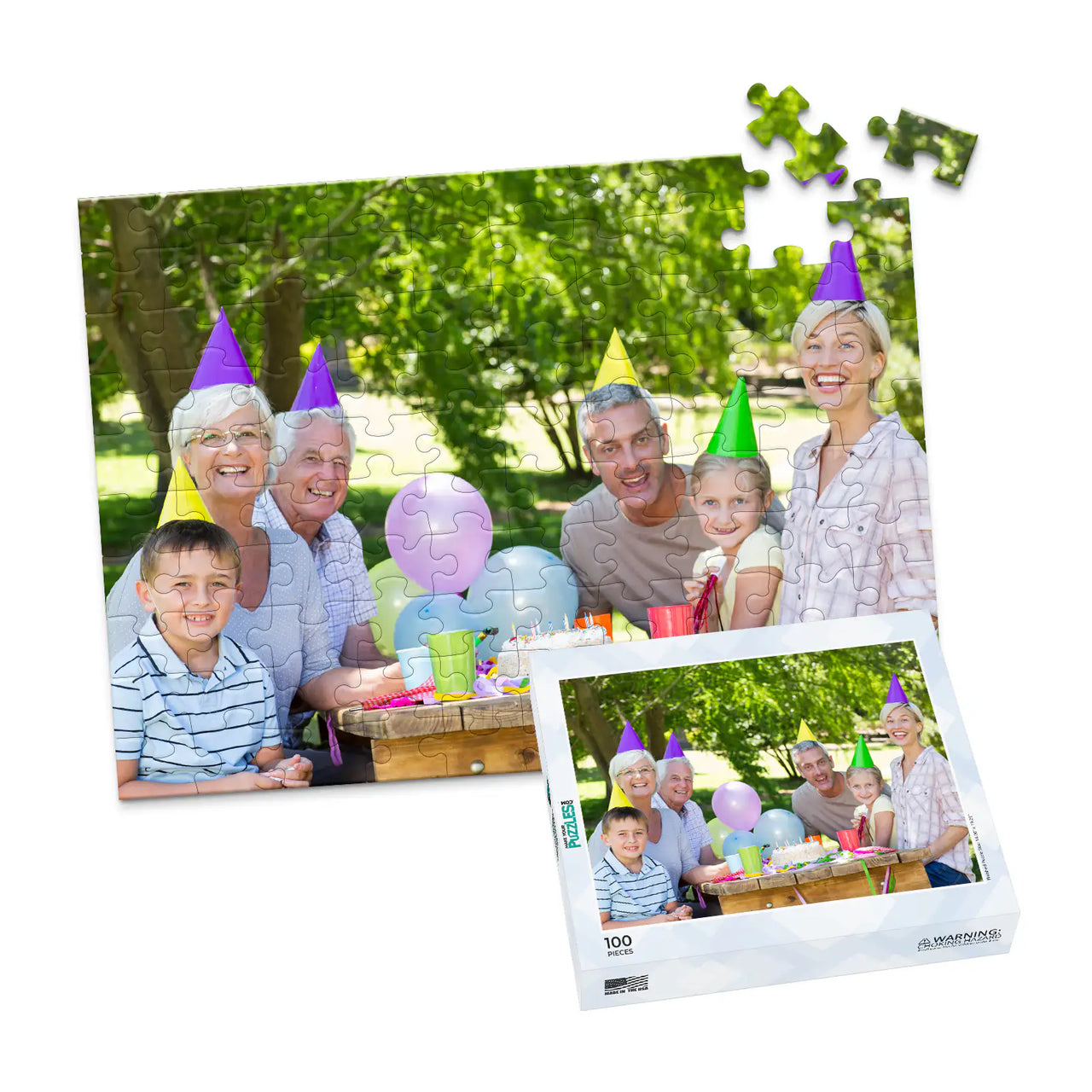 Personalized Birthday Puzzle Landscape orientation 100 Pieces and matching puzzle box showing a family portrait of six people celebrating a birthday outdoors