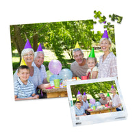 Personalized Birthday Puzzle Landscape orientation 100 Pieces and matching puzzle box showing a family portrait of six people celebrating a birthday outdoors