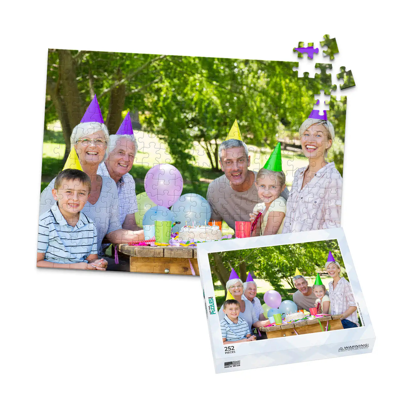 Personalized Birthday Puzzle Landscape orientation 252 Pieces and matching puzzle box showing a family portrait of six people celebrating a birthday outdoors