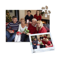252 piece personalized Christmas puzzle featuring a family opening gifts, shown with its matching puzzle box