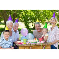 Personalized Birthday Puzzle Landscape orientation of a family celebrating a birthday outdoors with colorful party hats, balloons and birthday cake